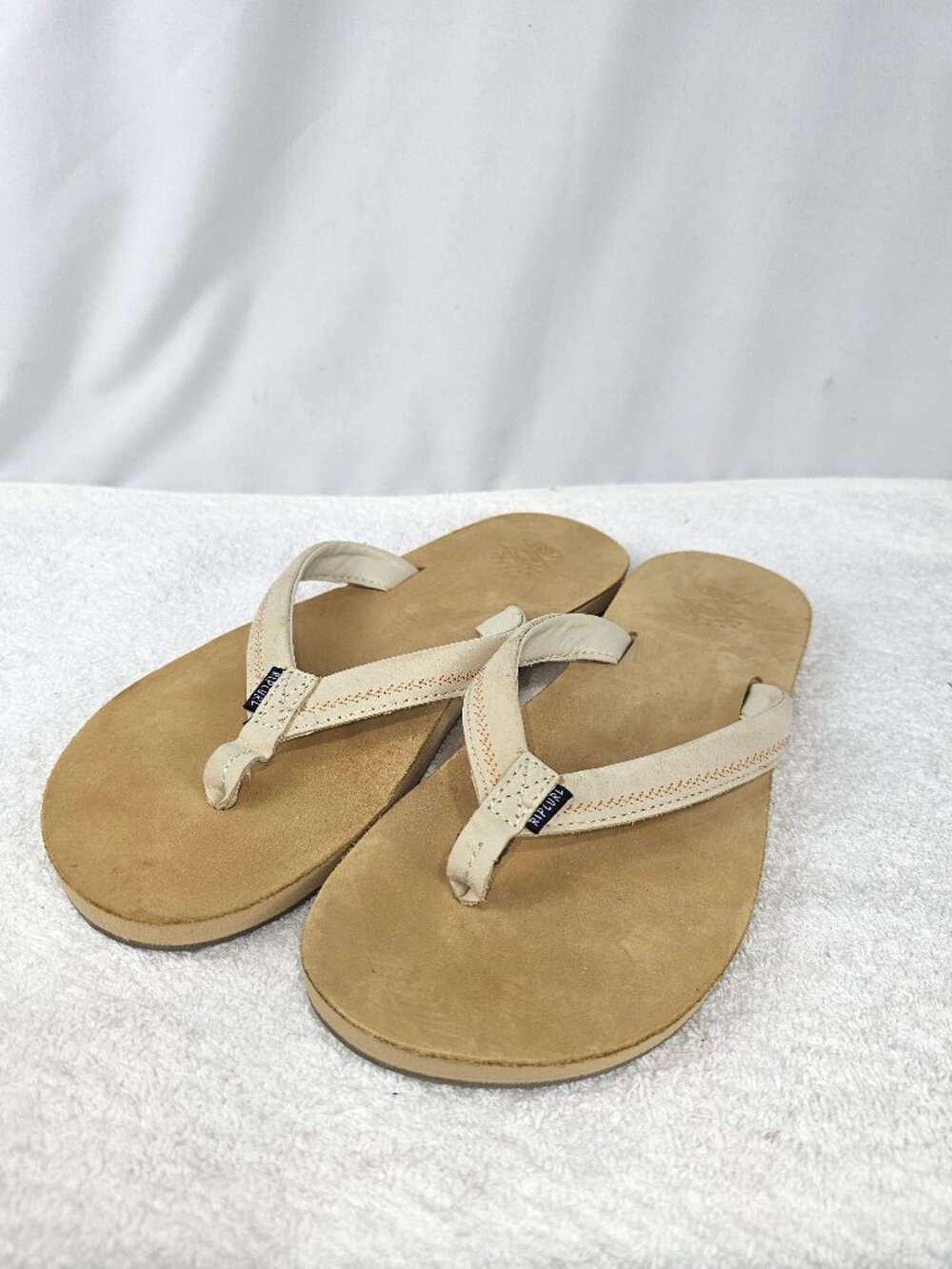 Rip Curl Women's Crystal Cove flip flops in a sand color,
